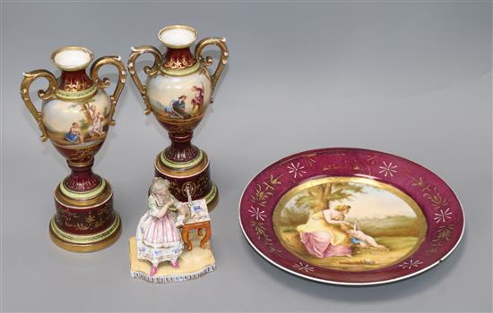 A Meissen seated figure, pair of Vienna vases and Vienna plate Vases 21cm high